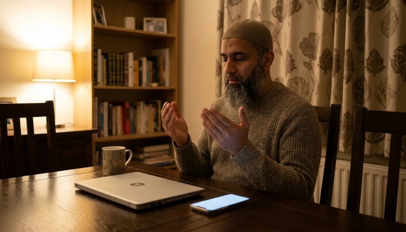 Muslim donor giving sadaqah online using a laptop